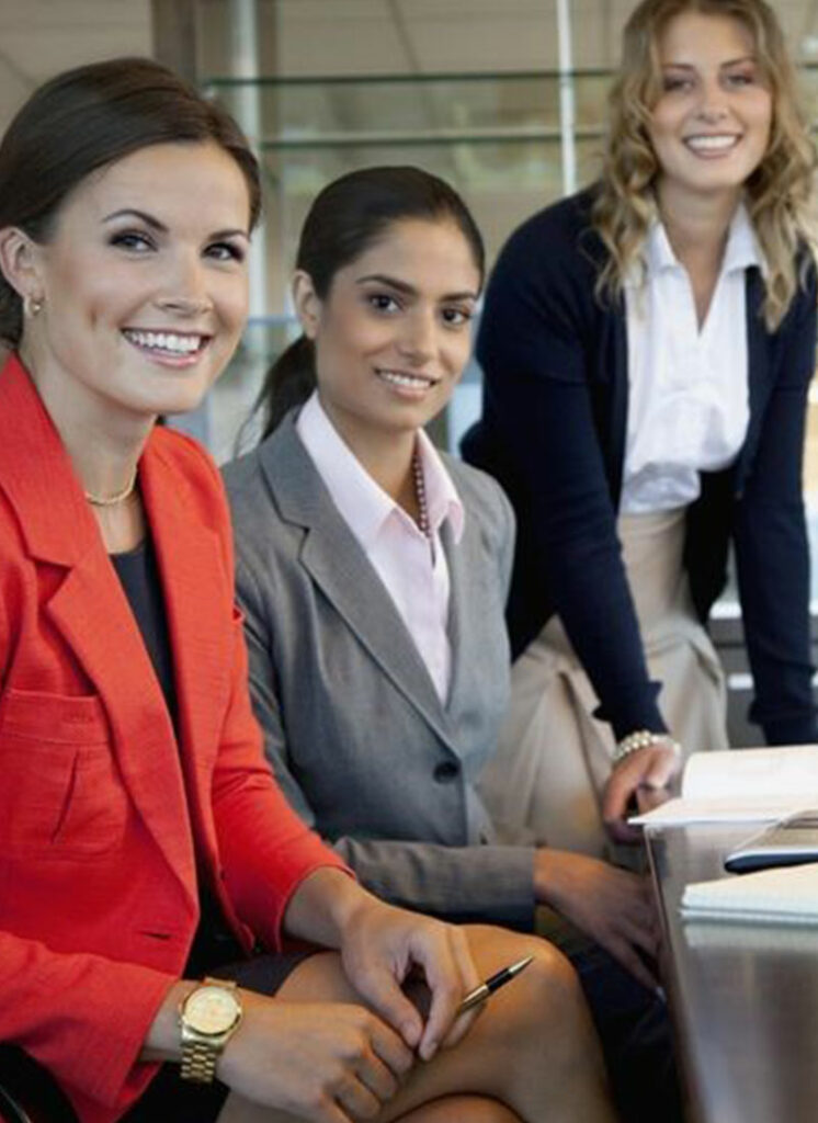 A group of women sitting at a table.