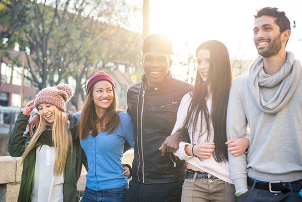 A group of people standing next to each other.